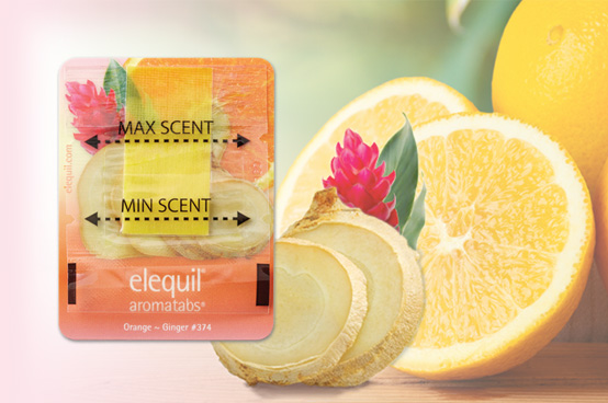 Elequil Aromatabs Orange-Ginger product picture with a background of ginger and orange slices
